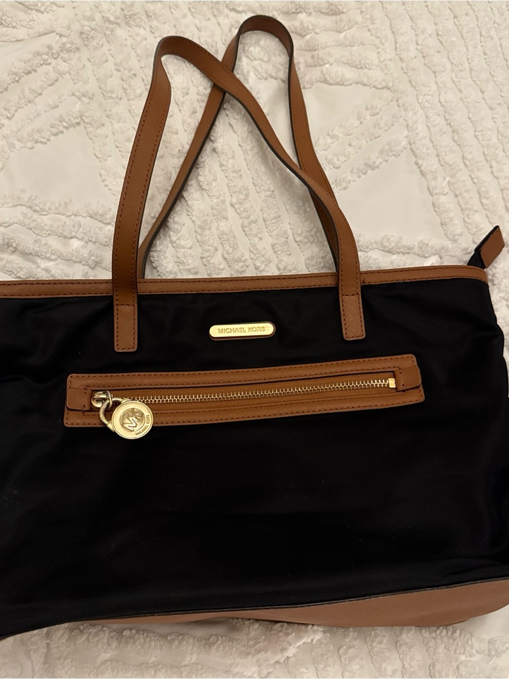 Michael Kors Black Tote with Brown Trim and Gold Accents